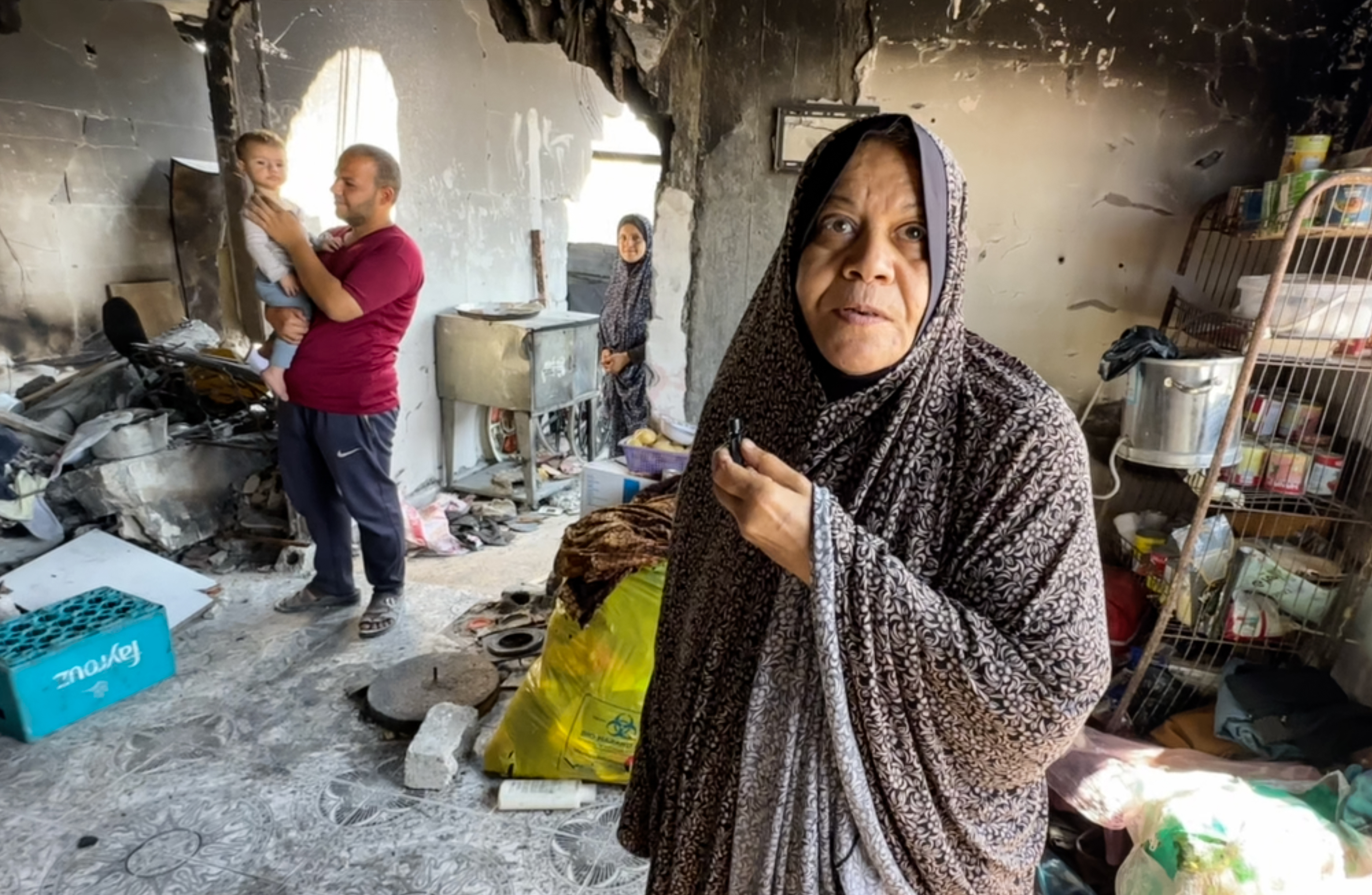Thi s exhausted woman, who refused to give her name, showed Al Jazeera what was left of her home